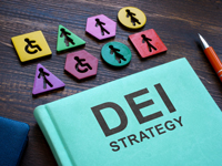 Graphic of turquoise book titled "DEI Strategy"