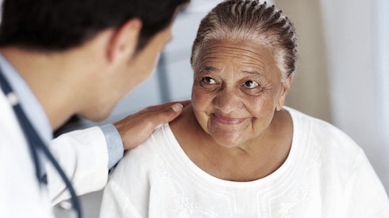 mature woman with doctor