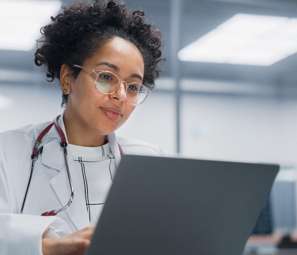 female doctor using computer