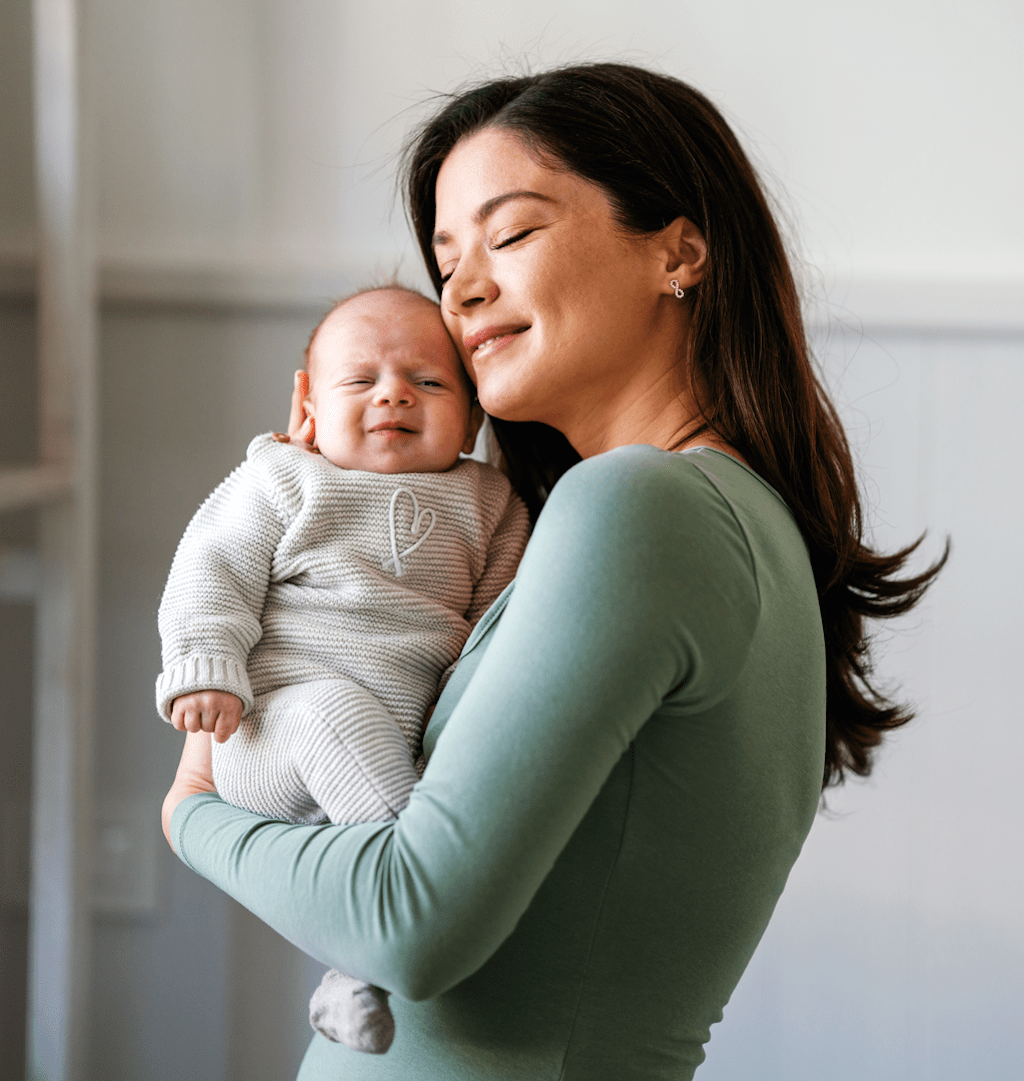 woman holding baby